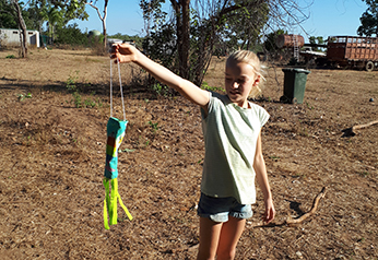 girl playing in her home property